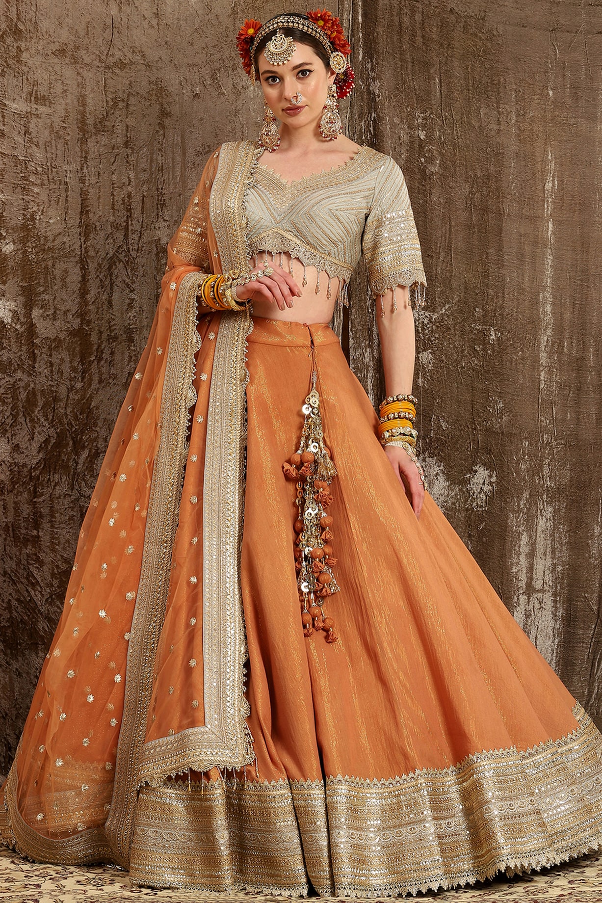 orange potli with lehenga