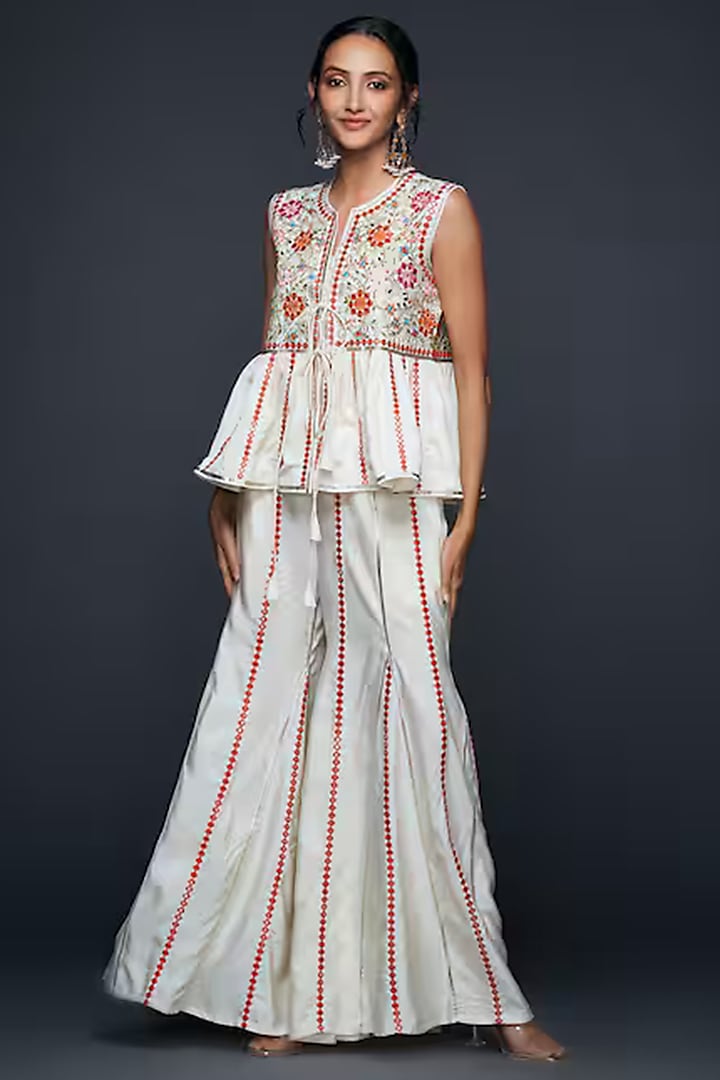 Off-White Viscose & Chanderi Silk Mirror Work Flared Pants by Gulabo By Abu Sandeep at Pernia's Pop Up Shop