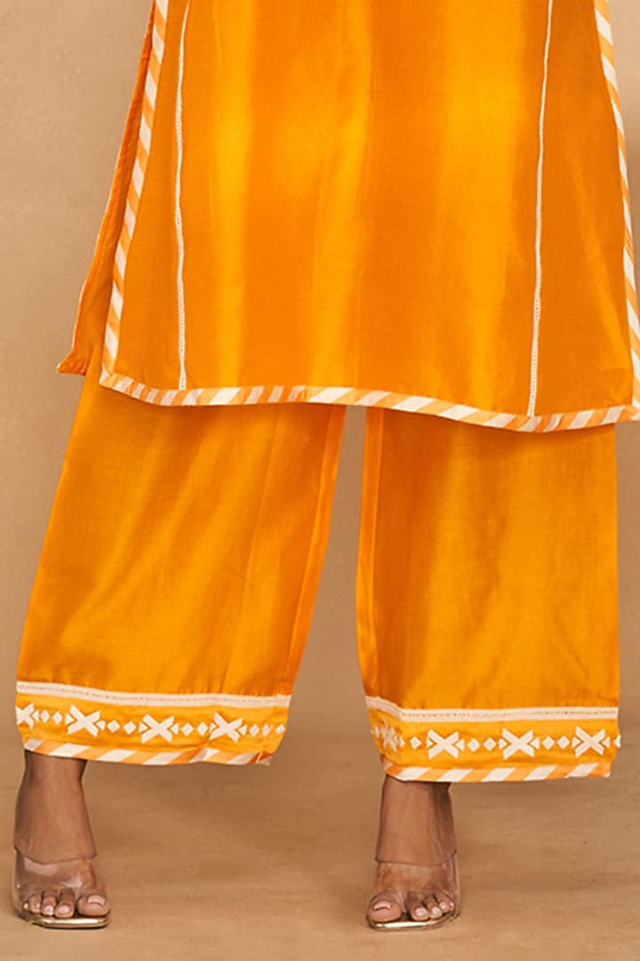 Orange Chanderi Straight Applique Work Pants by Gulabo By Abu Sandeep at Pernia's Pop Up Shop