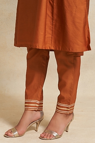 Dark Rust Pure Chanderi Silk Gota Work Pencil Pants by Gulabo By Abu Sandeep