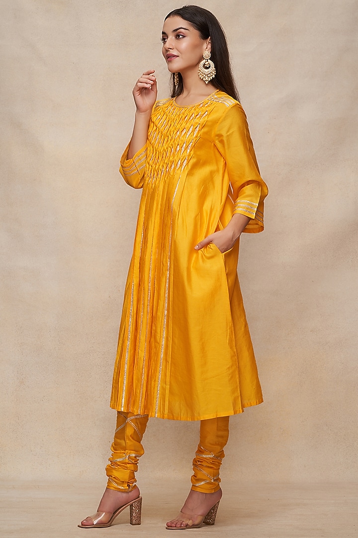 Mustard Chanderi Gota Work Pleated Kurta by Gulabo By Abu Sandeep at Pernia's Pop Up Shop