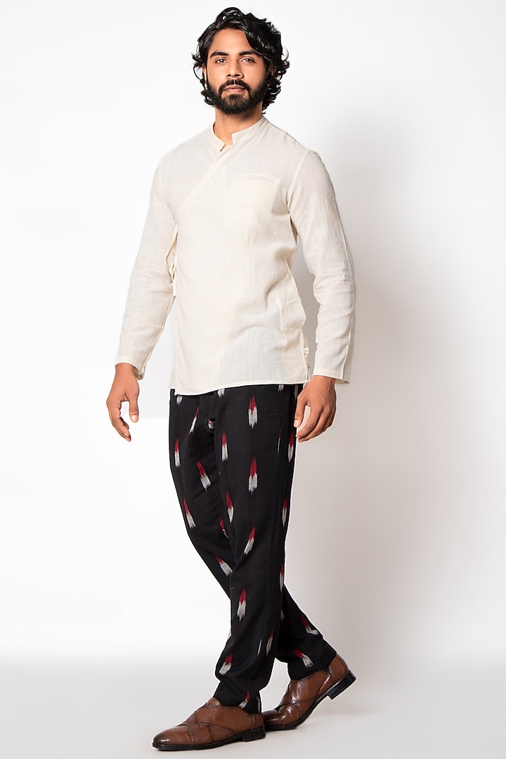 Black Ikat Printed Pants by Sepia Stories Men at Pernia's Pop Up Shop