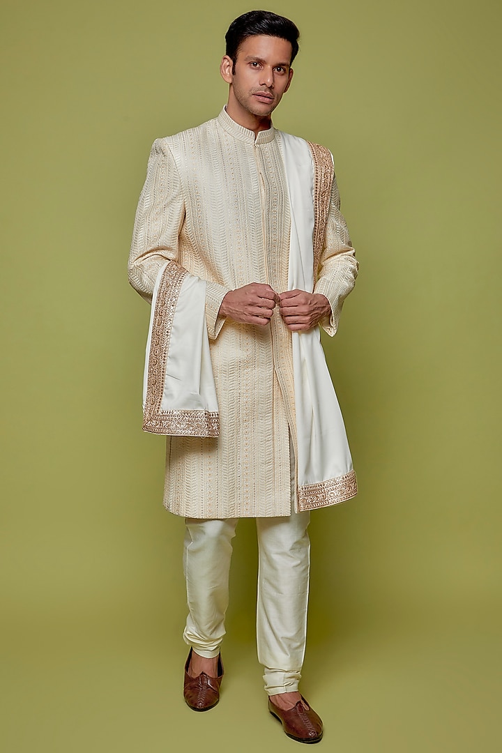 Ivory Silk Dupion Embroidered Wedding Sherwani Set by SVEN SUITS at Pernia's Pop Up Shop