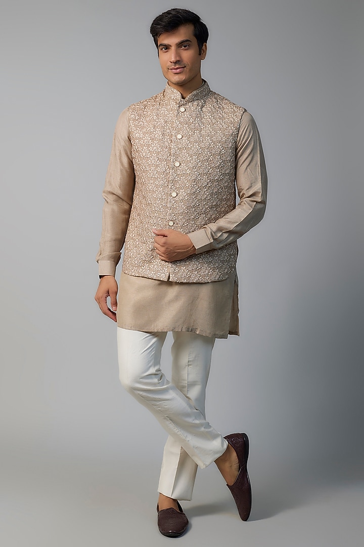 Rustic Bronze Faux Silk Cutdana Hand Embroidered Bundi Jacket Set by SVEN SUITS at Pernia's Pop Up Shop