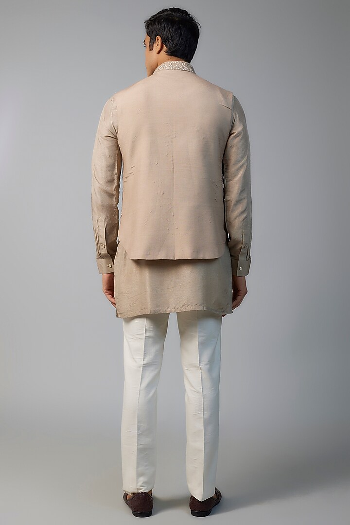 Rustic Bronze Faux Silk Cutdana Hand Embroidered Bundi Jacket Set by SVEN SUITS at Pernia's Pop Up Shop