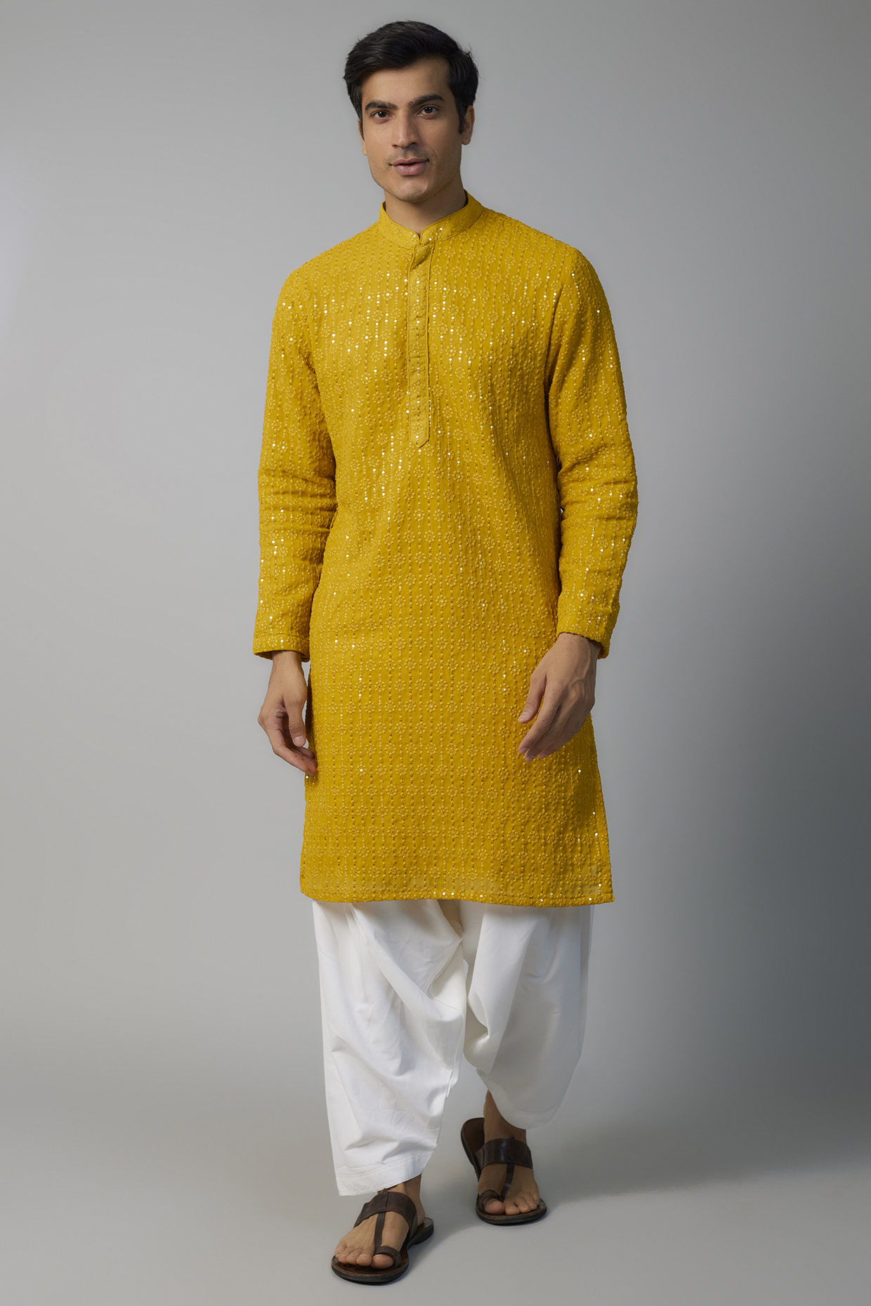 Mustard Yellow Georgette Sequins Embroidered Kurta Set by SVEN SUITS at Pernia's Pop Up Shop