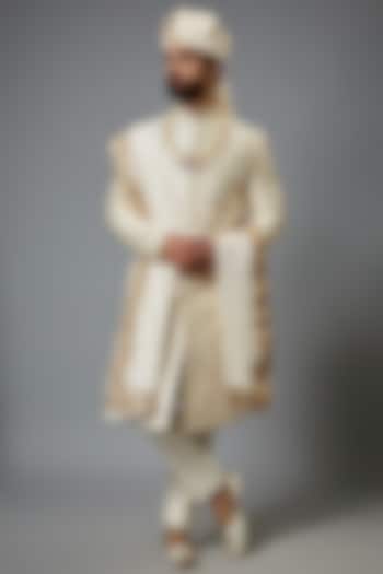 Gold Silk Hand Embroidered Groom Sherwani Set by SVEN SUITS at Pernia's Pop Up Shop