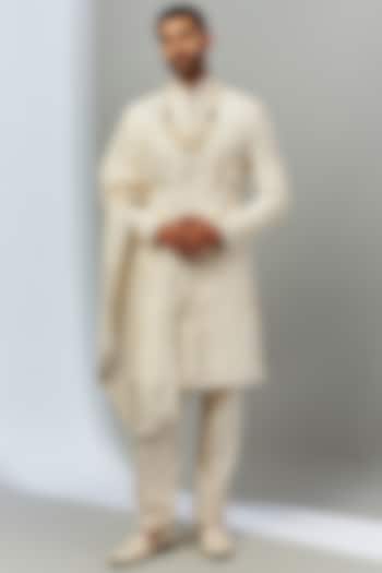 Ivory Silk Embroidered Groom Sherwani Set by SVEN SUITS at Pernia's Pop Up Shop