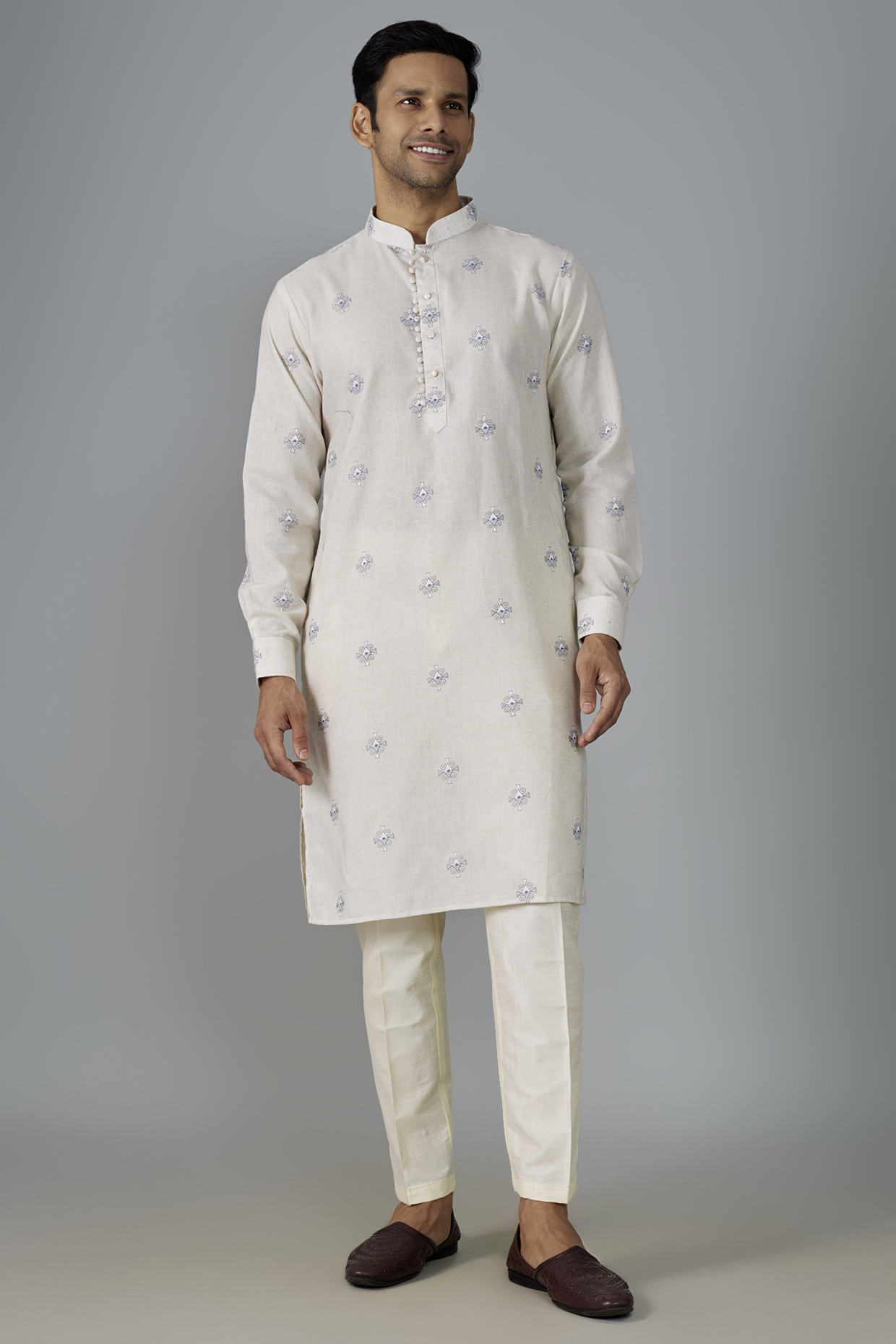 Ivory Linen Embroidered Kurta Set by SVEN SUITS at Pernia's Pop Up Shop