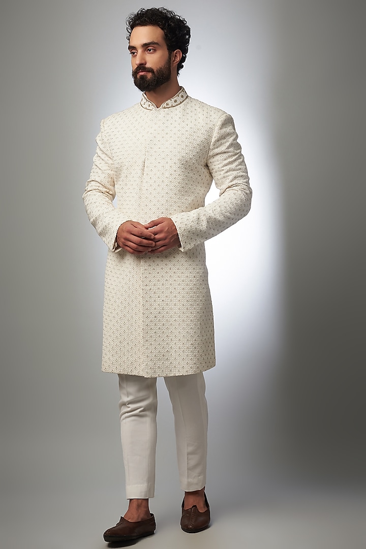 Ivory Silk Embroidered Wedding Sherwani Set by SVEN SUITS at Pernia's Pop Up Shop