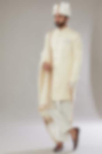 Ivory Raw Silk Embroidered Groom Sherwani Set by SVEN SUITS at Pernia's Pop Up Shop