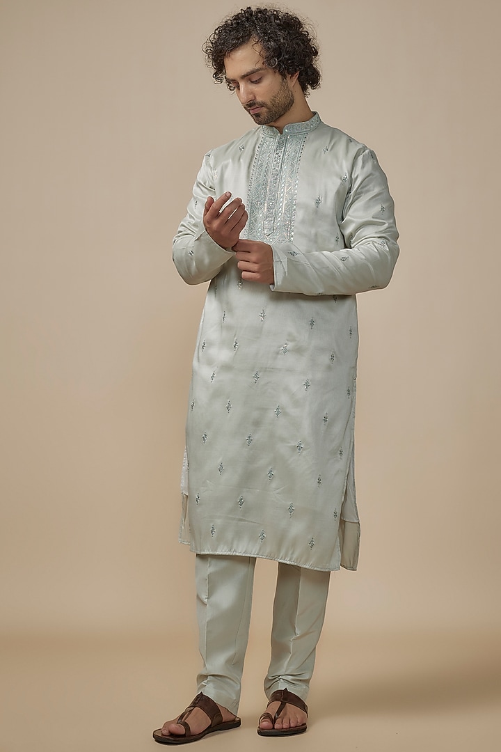 Green Faux Silk Machine Embroidered Kurta Set by SVEN SUITS at Pernia's Pop Up Shop