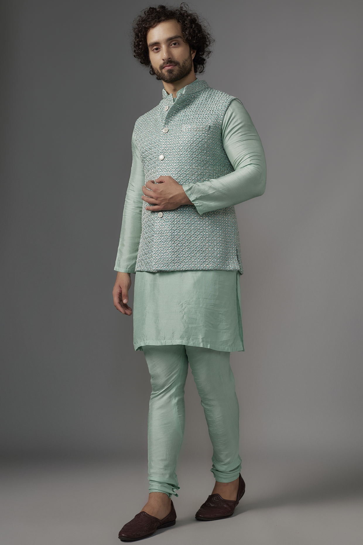 Mint Green Faux Silk Thread Zari Embroidered Kurta Set by SVEN SUITS