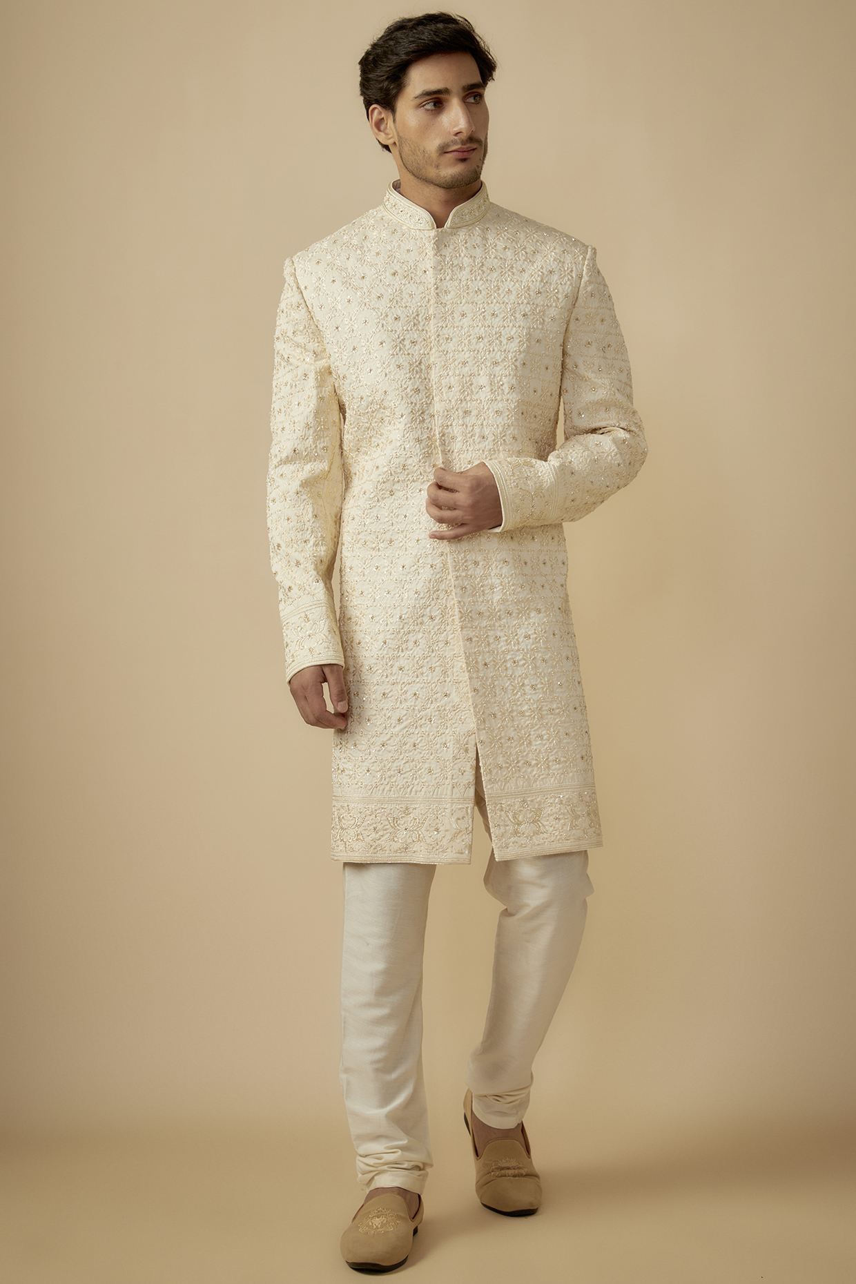 Cream Silk Jaal Hand Embroidered Wedding Sherwani Set by SVEN SUITS at Pernia's Pop Up Shop