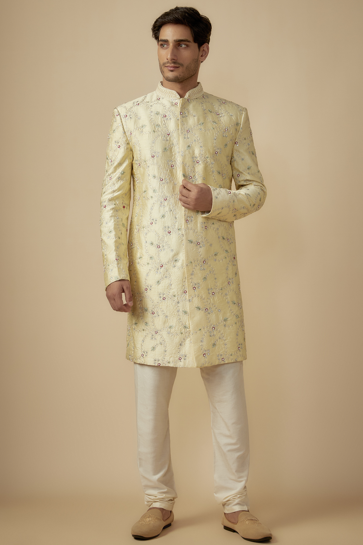 Cream Silk Jaal Hand Embroidered Sherwani Set by SVEN SUITS