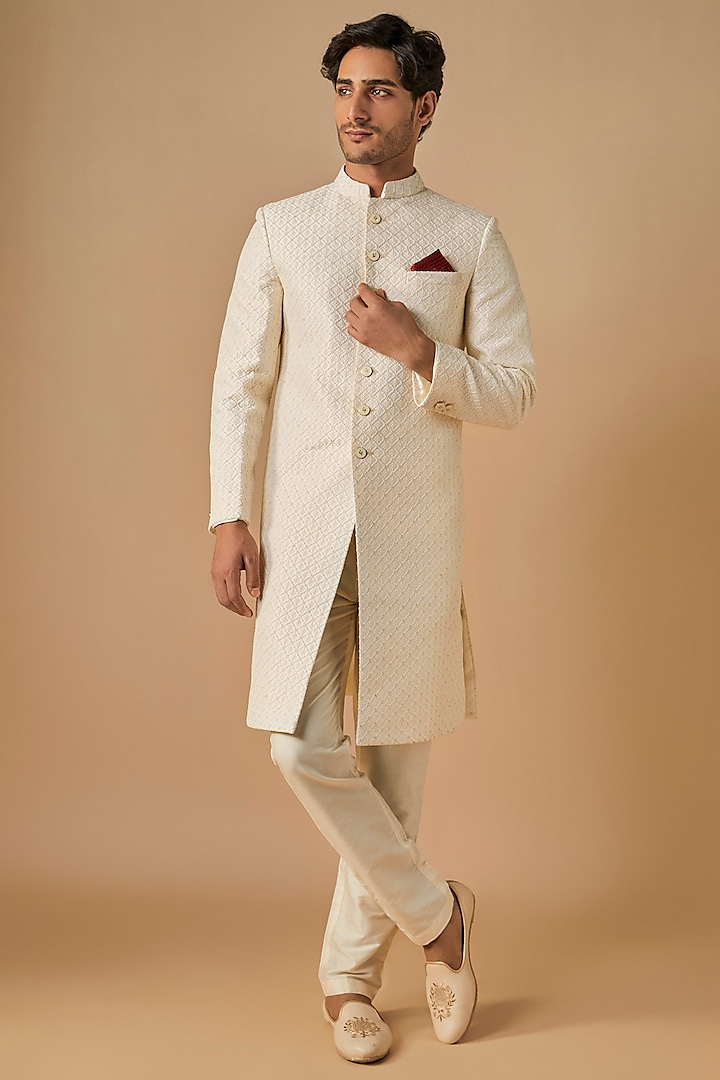 Ivory Silk Floral Motif Embroidered Wedding Sherwani Set by SVEN SUITS at Pernia's Pop Up Shop