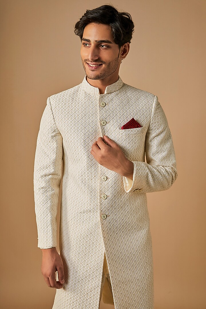 Ivory Silk Floral Motif Embroidered Wedding Sherwani Set by SVEN SUITS at Pernia's Pop Up Shop