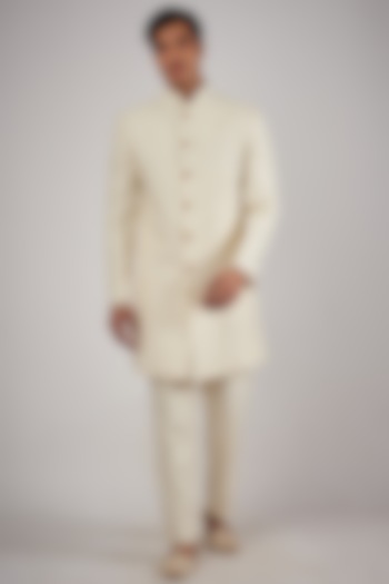 Ivory Silk Hand Embroidered Wedding Sherwani Set by SVEN SUITS at Pernia's Pop Up Shop