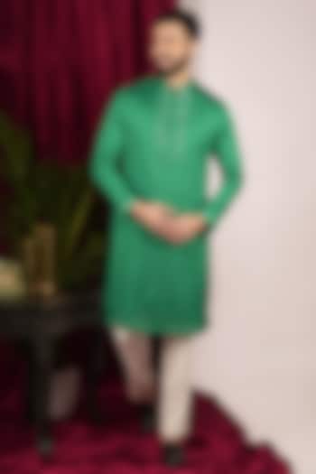 Green Faux Tussar Silk Floral Embroidered Kurta Set by SVEN SUITS
