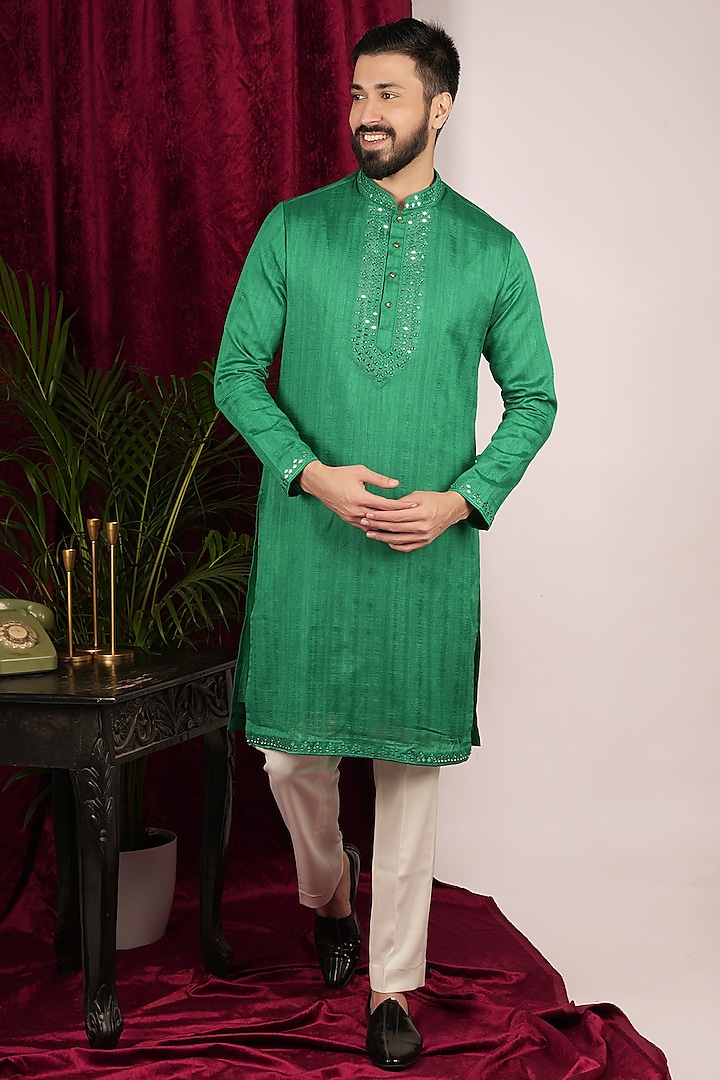 Green Faux Tussar Silk Floral Embroidered Kurta Set by SVEN SUITS