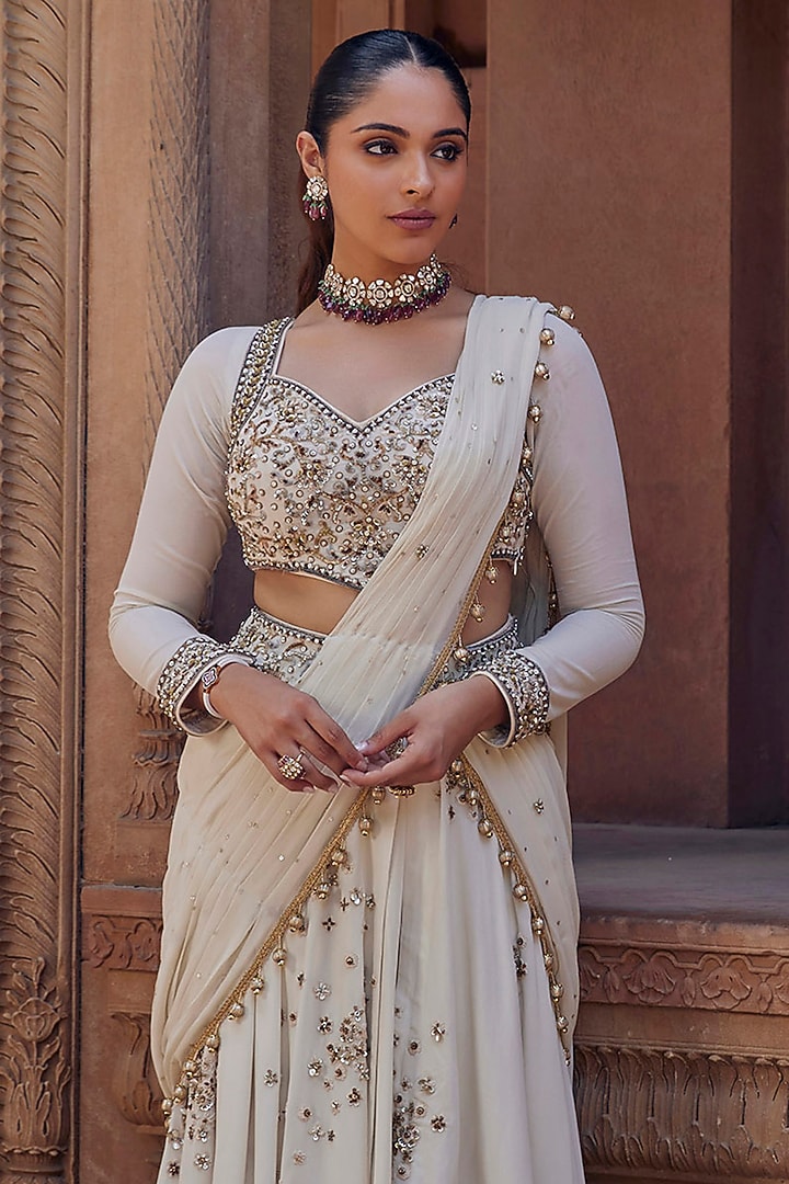 Ivory Raw Silk Sequins & Cutdana Embroidered Pre-Draped Reception Saree Set by Studio Bagechaa at Pernia's Pop Up Shop