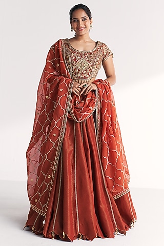 Rust Bandhani Tissue Crushed Lehenga Set by Studio Bagechaa