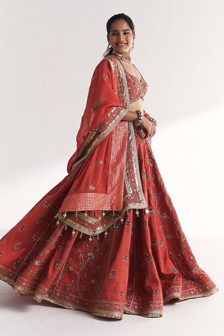 Tangerine Raw Silk Hand Embroidered Bridal Lehenga Set by Studio Bagechaa at Pernia's Pop Up Shop