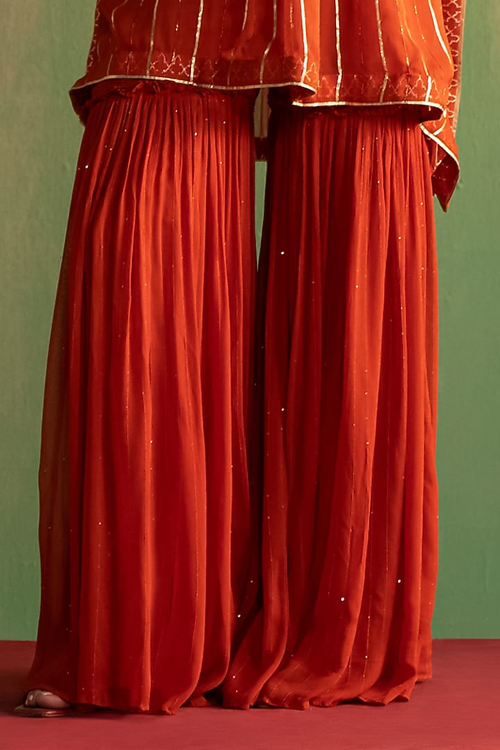 Rust Orange Georgette Lurex Party Wear Sharara Set by Studio Bagechaa at Pernia's Pop Up Shop