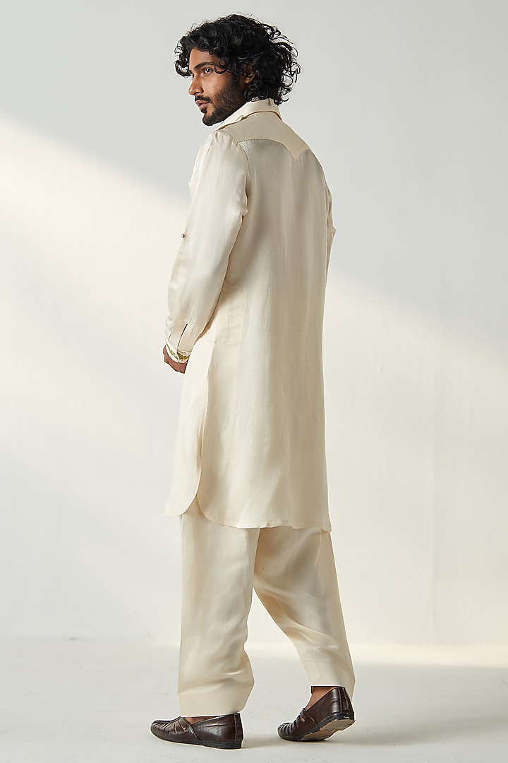 Ivory Linen Satin Dori Embroidered Pathani Kurta Set by Studio Bagechaa Men at Pernia's Pop Up Shop