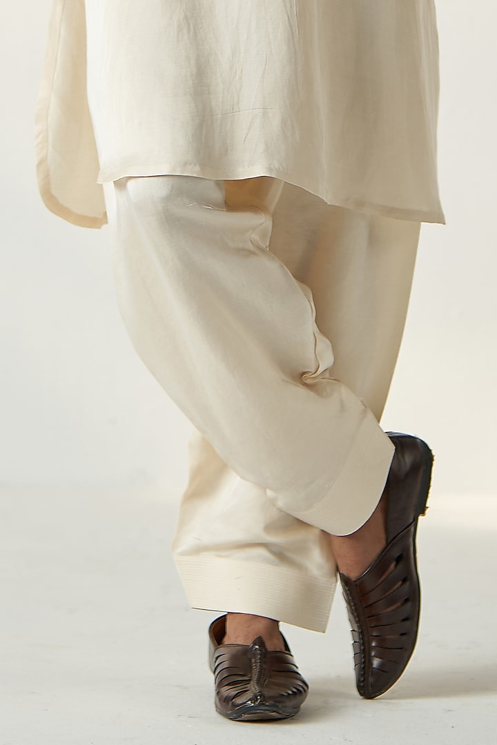 Ivory Linen Satin Dori Embroidered Pathani Kurta Set by Studio Bagechaa Men at Pernia's Pop Up Shop