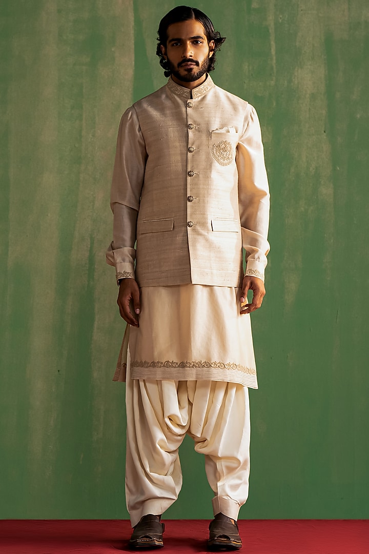 Beige Raw Silk Embroidered Bundi Jacket Set by Studio Bagechaa Men