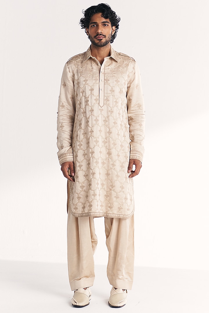 Ivory Linen Satin Dori Embroidered Pathani Kurta Set by Studio Bagechaa Men at Pernia's Pop Up Shop
