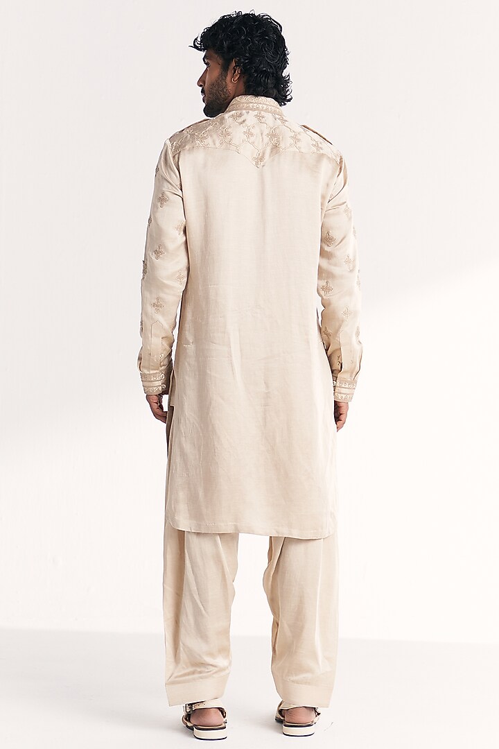 Ivory Linen Satin Dori Embroidered Pathani Kurta Set by Studio Bagechaa Men at Pernia's Pop Up Shop