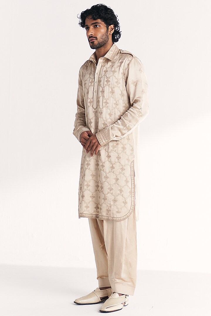 Ivory Linen Satin Dori Embroidered Pathani Kurta Set by Studio Bagechaa Men at Pernia's Pop Up Shop