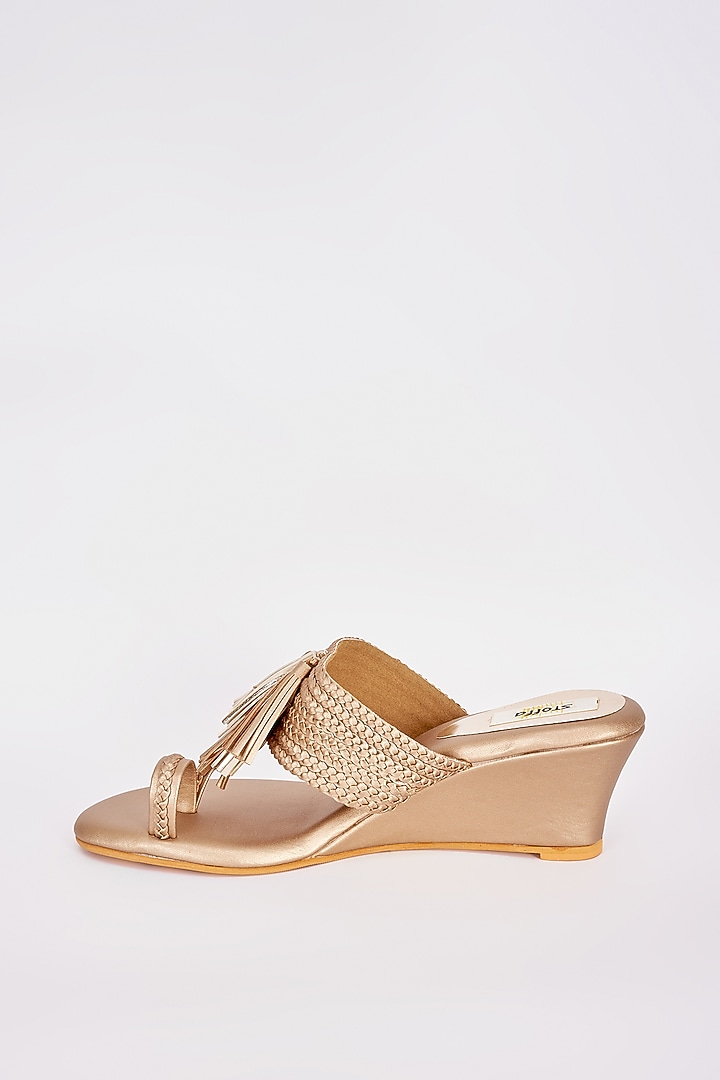 Gold Faux Leather Tasseled Wedges by Stoffa Bride at Pernia's Pop Up Shop