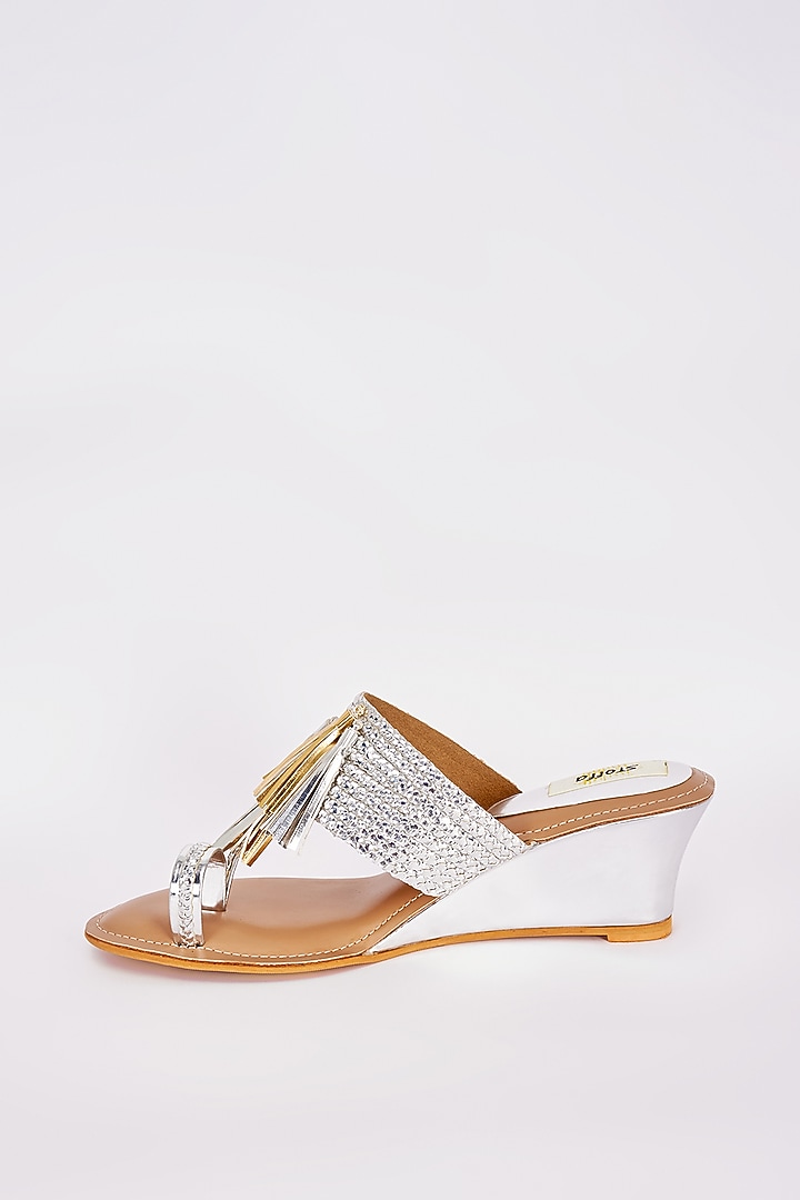 Silver Faux Leather Tasseled Wedges by Stoffa Bride at Pernia's Pop Up Shop
