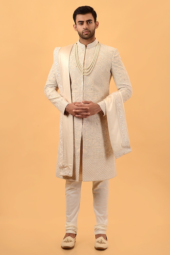 Beige Raw Silk Hand & Machine Embroidered Sherwani Set by STEEL