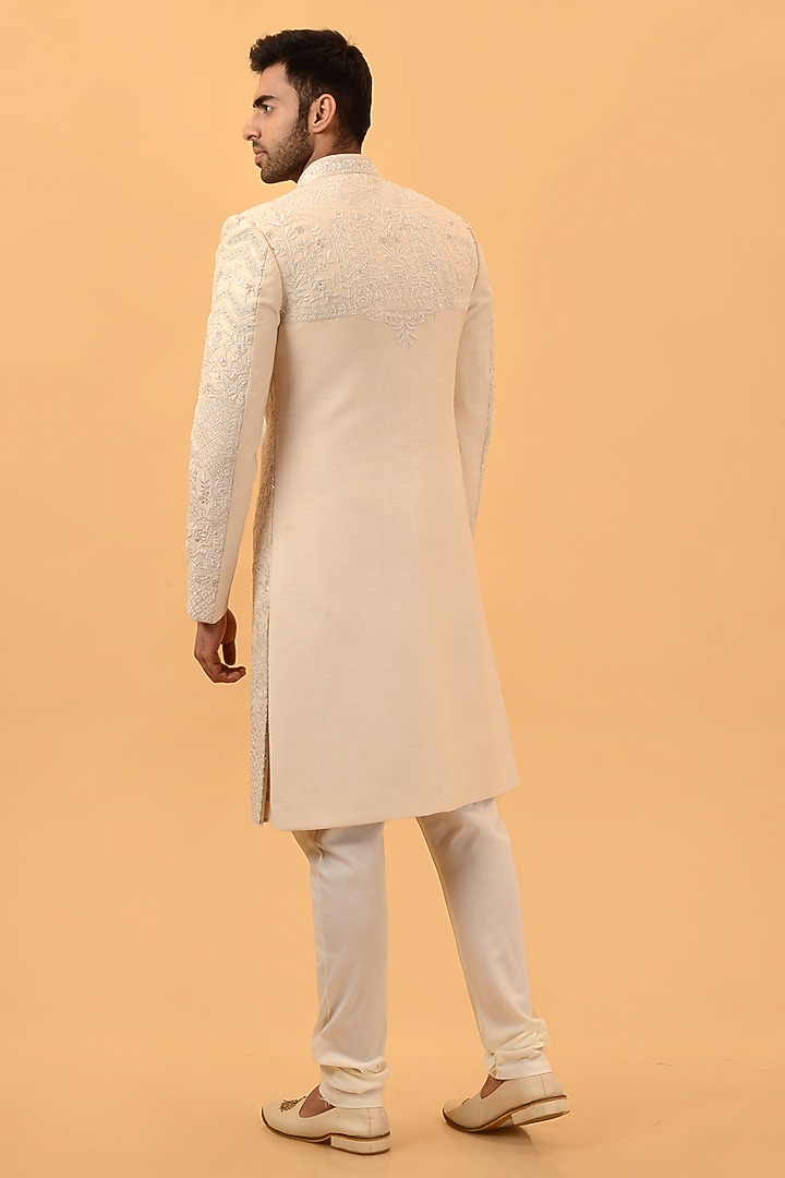 Beige Raw Silk Hand & Machine Embroidered Groom Sherwani Set by STEEL at Pernia's Pop Up Shop
