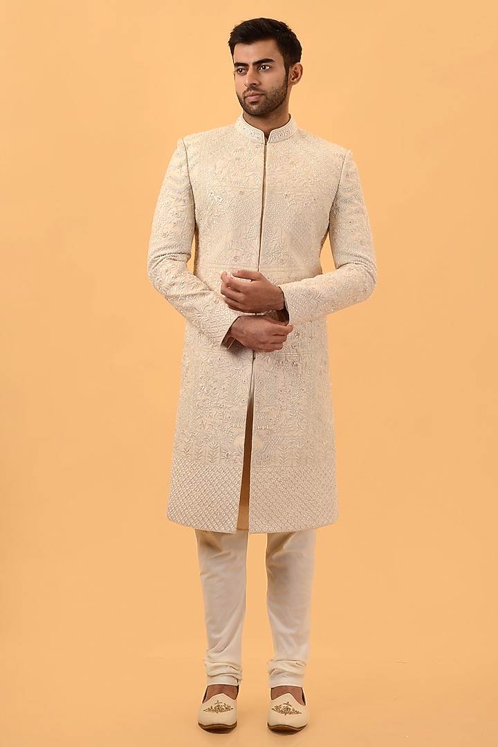 Beige Raw Silk Hand & Machine Embroidered Groom Sherwani Set by STEEL at Pernia's Pop Up Shop