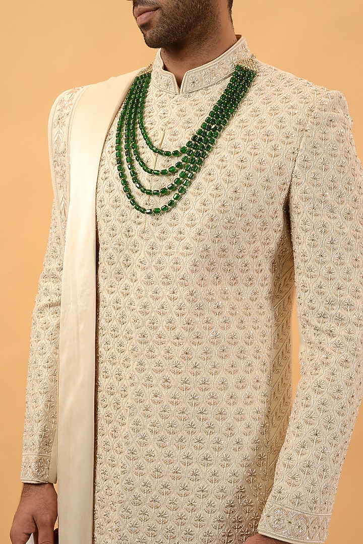 Cream Raw Silk Hand & Machine Embroidered Groom Sherwani Set by STEEL at Pernia's Pop Up Shop