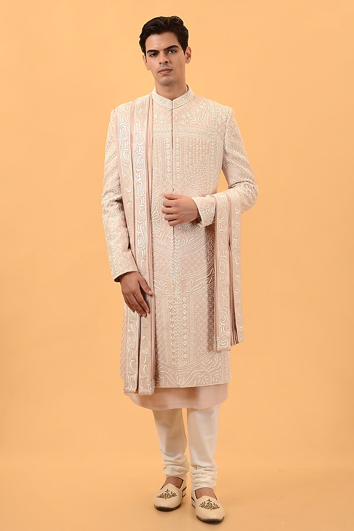 Peach Raw Silk Hand & Machine Embroidered Groom Sherwani Set by STEEL at Pernia's Pop Up Shop