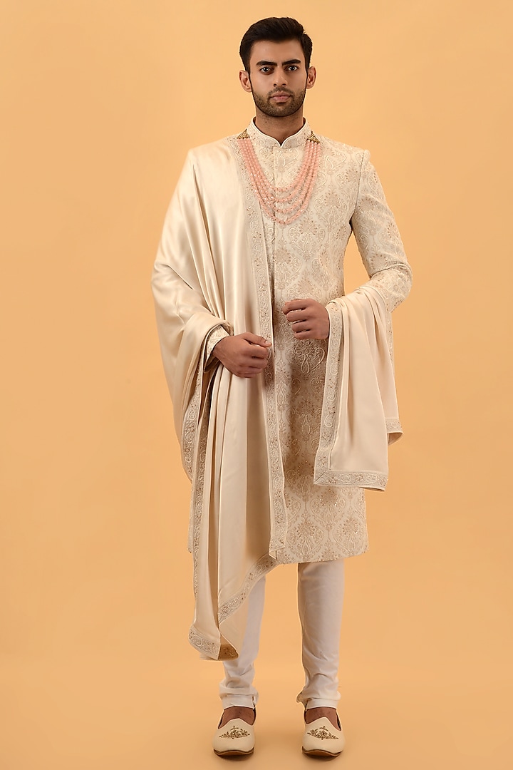 Beige Raw Silk Hand & Machine Embroidered Sherwani Set by STEEL