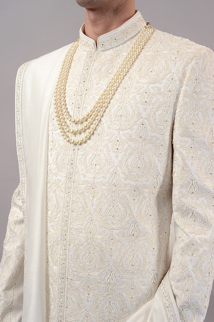 Off-White Raw Silk Hand & Machine Embroidered Wedding Sherwani Set by STEEL at Pernia's Pop Up Shop
