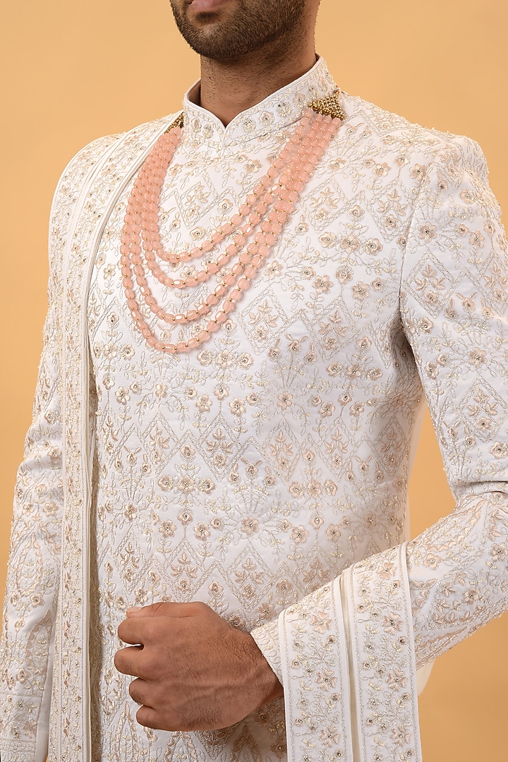 Off-White Raw Silk Hand & Machine Embroidered Wedding Sherwani Set by STEEL at Pernia's Pop Up Shop