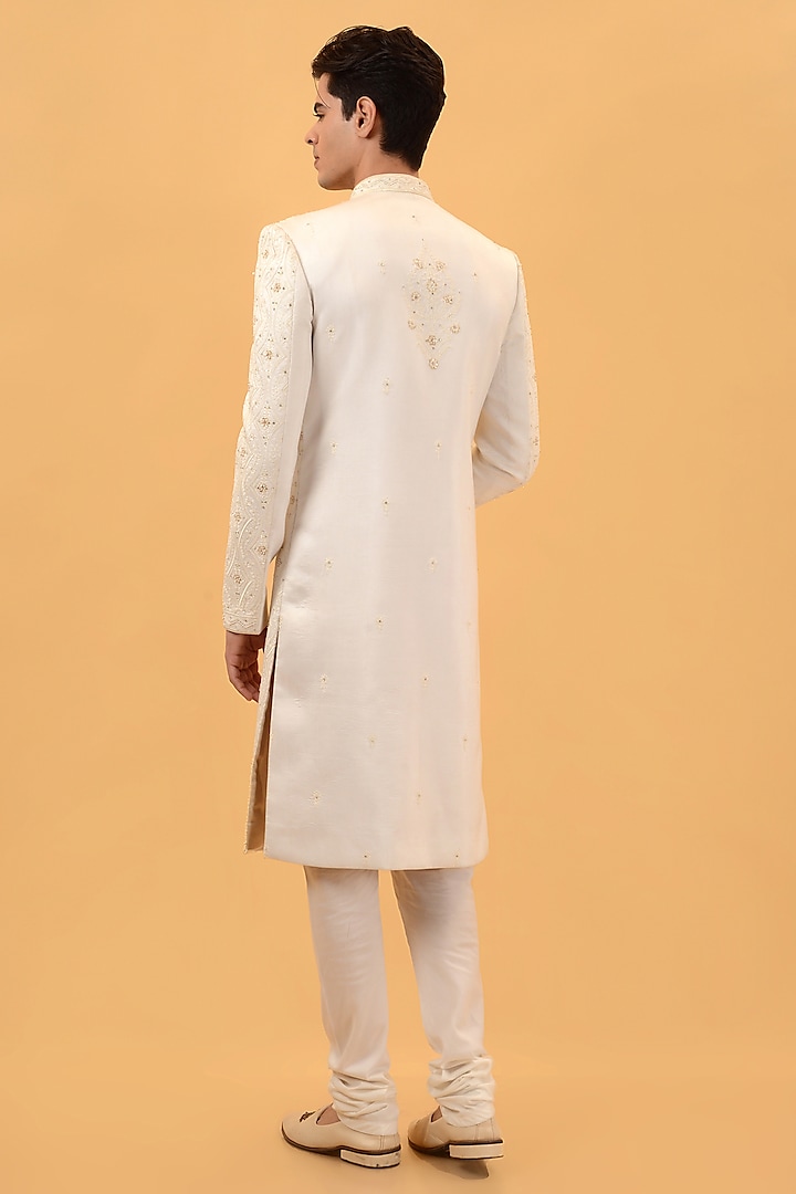 Cream Raw Silk Machine & Hand Embroidered Wedding Sherwani Set by STEEL at Pernia's Pop Up Shop