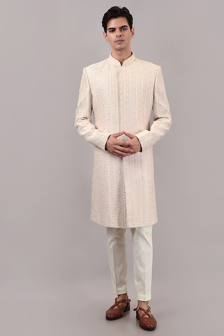 Cream Raw Silk Machine & Hand Embroidered Wedding Sherwani Set by STEEL at Pernia's Pop Up Shop