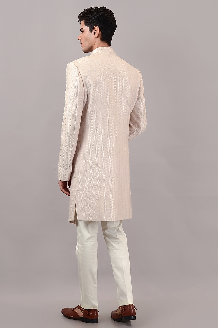 Cream Raw Silk Machine & Hand Embroidered Wedding Sherwani Set by STEEL at Pernia's Pop Up Shop