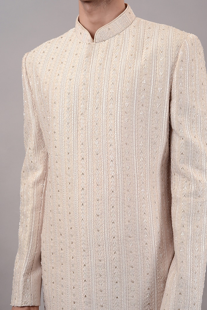 Cream Raw Silk Machine & Hand Embroidered Wedding Sherwani Set by STEEL at Pernia's Pop Up Shop