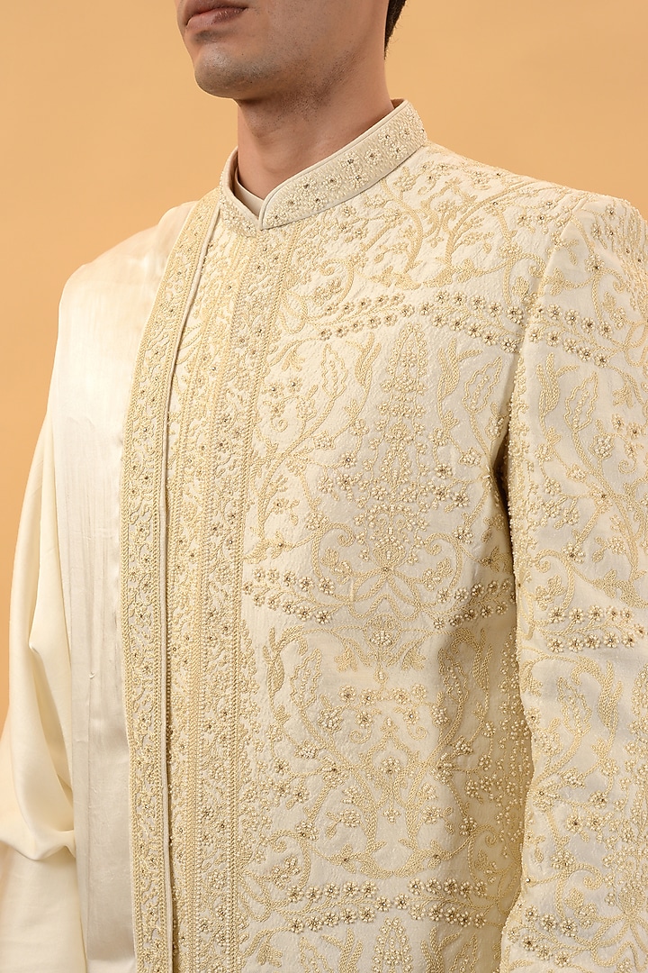 Beige Raw Silk Machine & Hand Embroidered Wedding Sherwani Set by STEEL at Pernia's Pop Up Shop