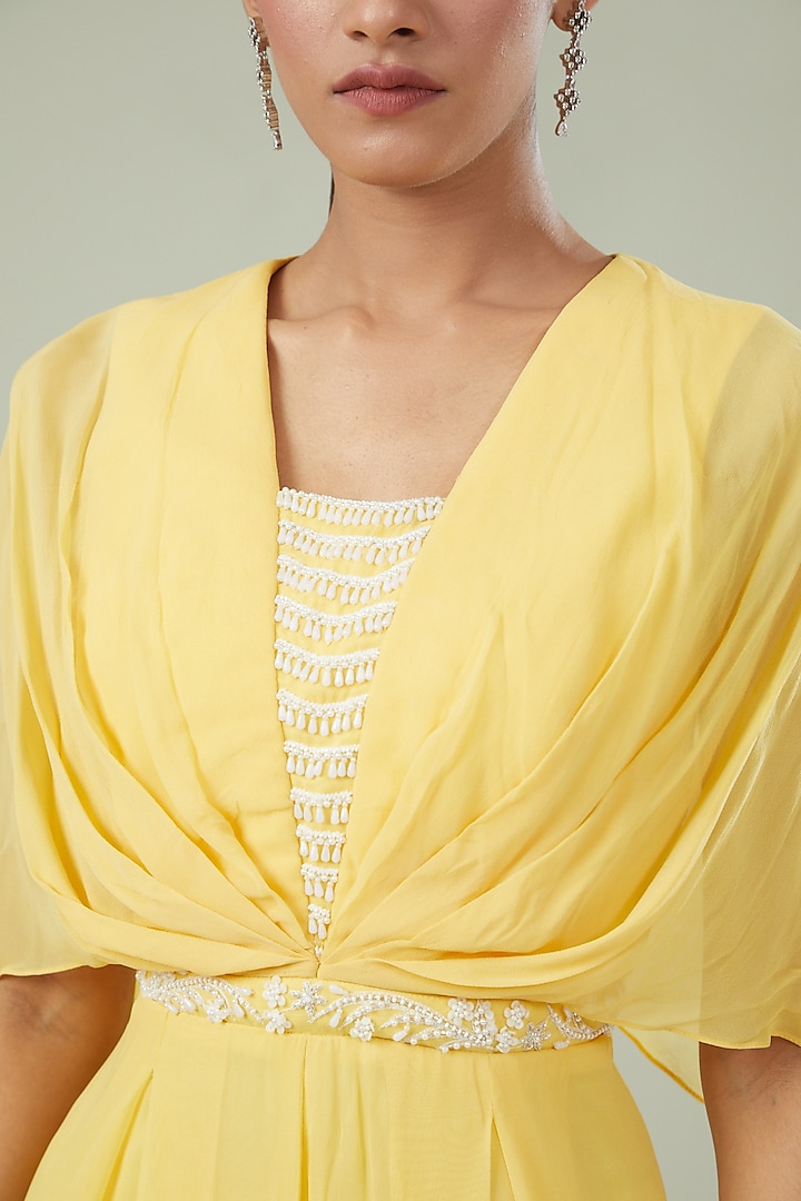 Yellow Georgette Embroidered Pleated Jumpsuit by Seema Thukral at Pernia's Pop Up Shop